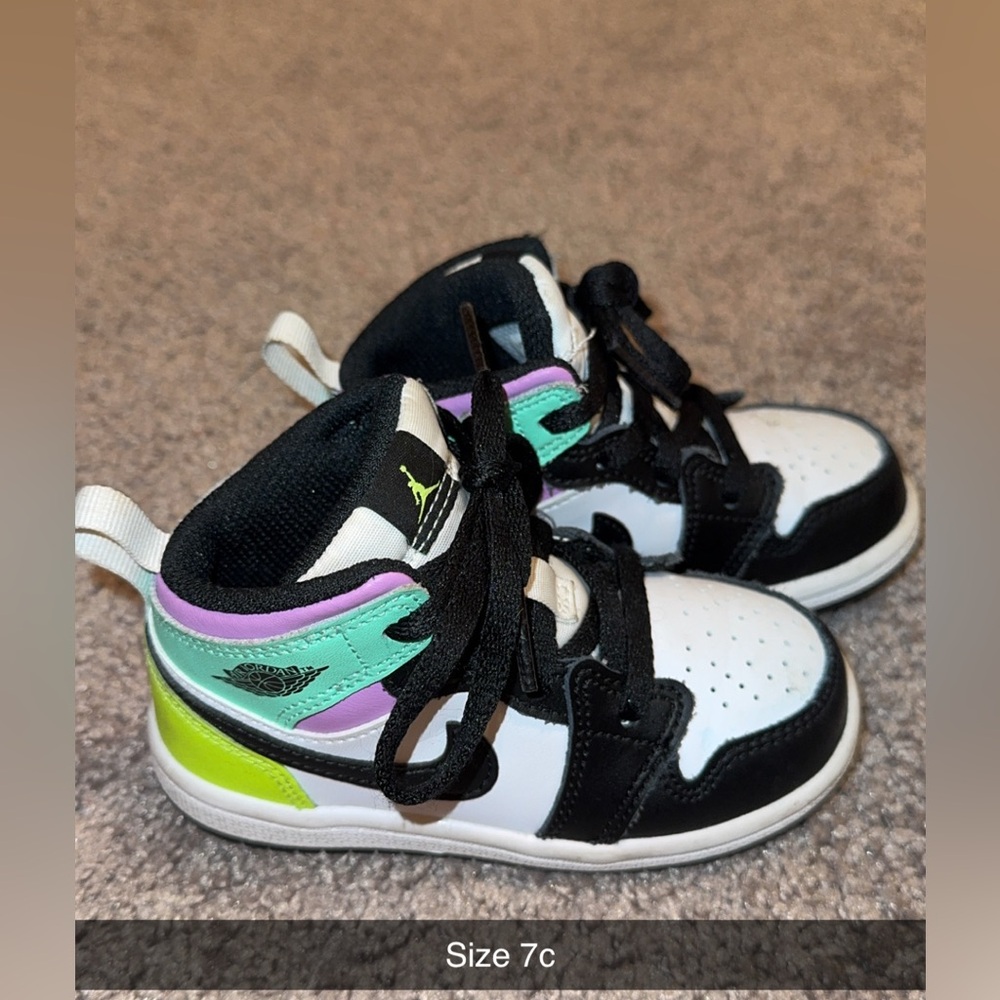 Nike Kids Black and White Sneakers with Green and Purple Accents